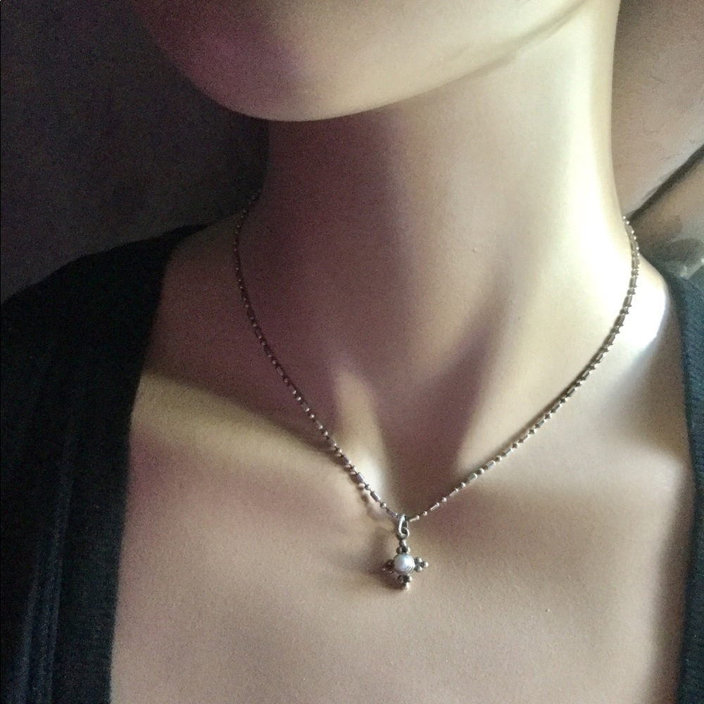 Silver pearl type charm necklace